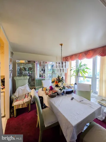 a view of a livingroom with furniture window and outside view