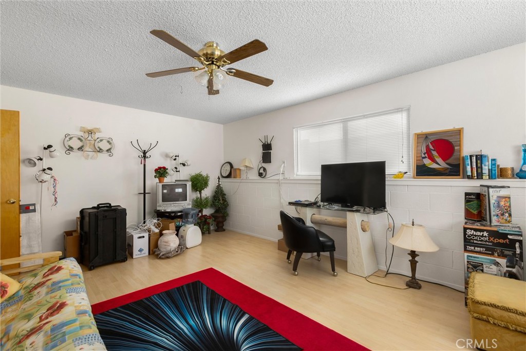 180 G Street Cayucos, CA 93430 - Photo 25 of 32 a view of a livingroom with workspace and a window