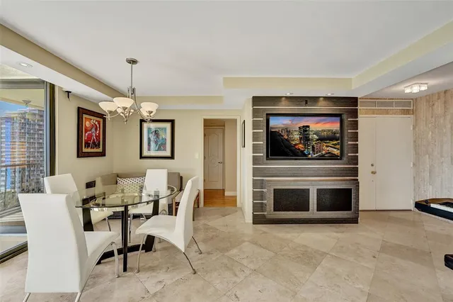 a kitchen with granite countertop a sink a stove and cabinets