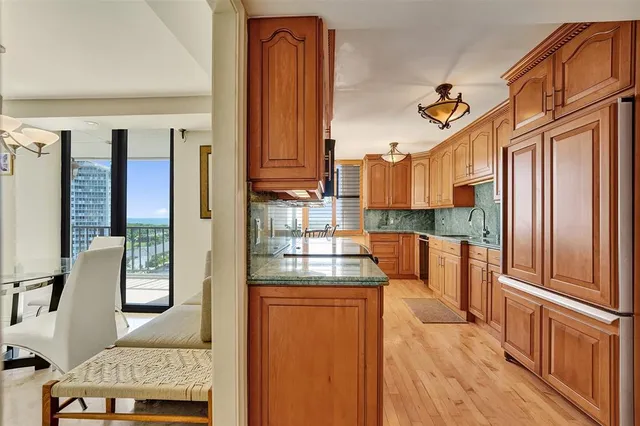 a view of a kitchen with washer and dryer