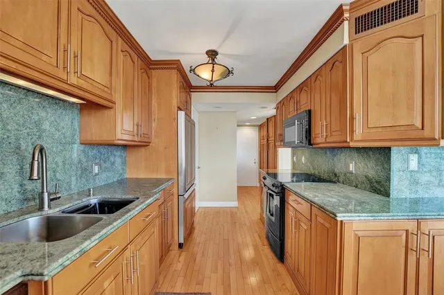 a view of outdoor space with swimming pool and lake view