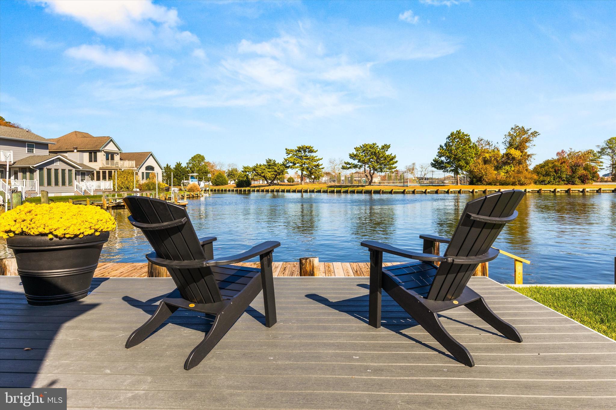 61 Grand Port Road Ocean Pines, MD 21811 - Photo 3 of 68 a view of a chairs and table on the terrace