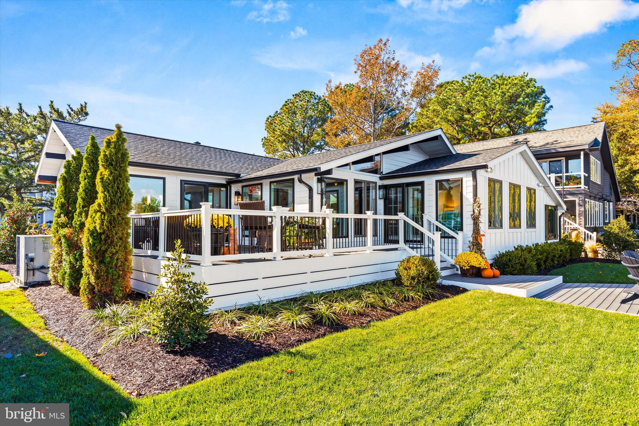 61 Grand Port Road Ocean Pines, MD 21811 - Photo 42 of 68 front view of a house with a yard