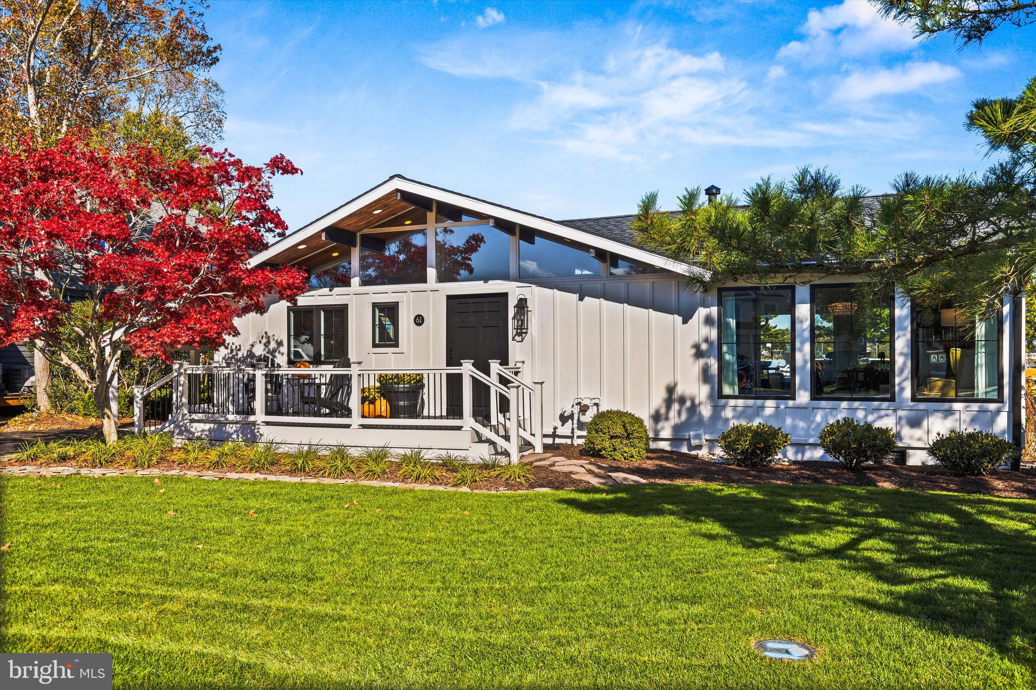 61 Grand Port Road Ocean Pines, MD 21811 - Photo 51 of 68 a front view of a house with garden