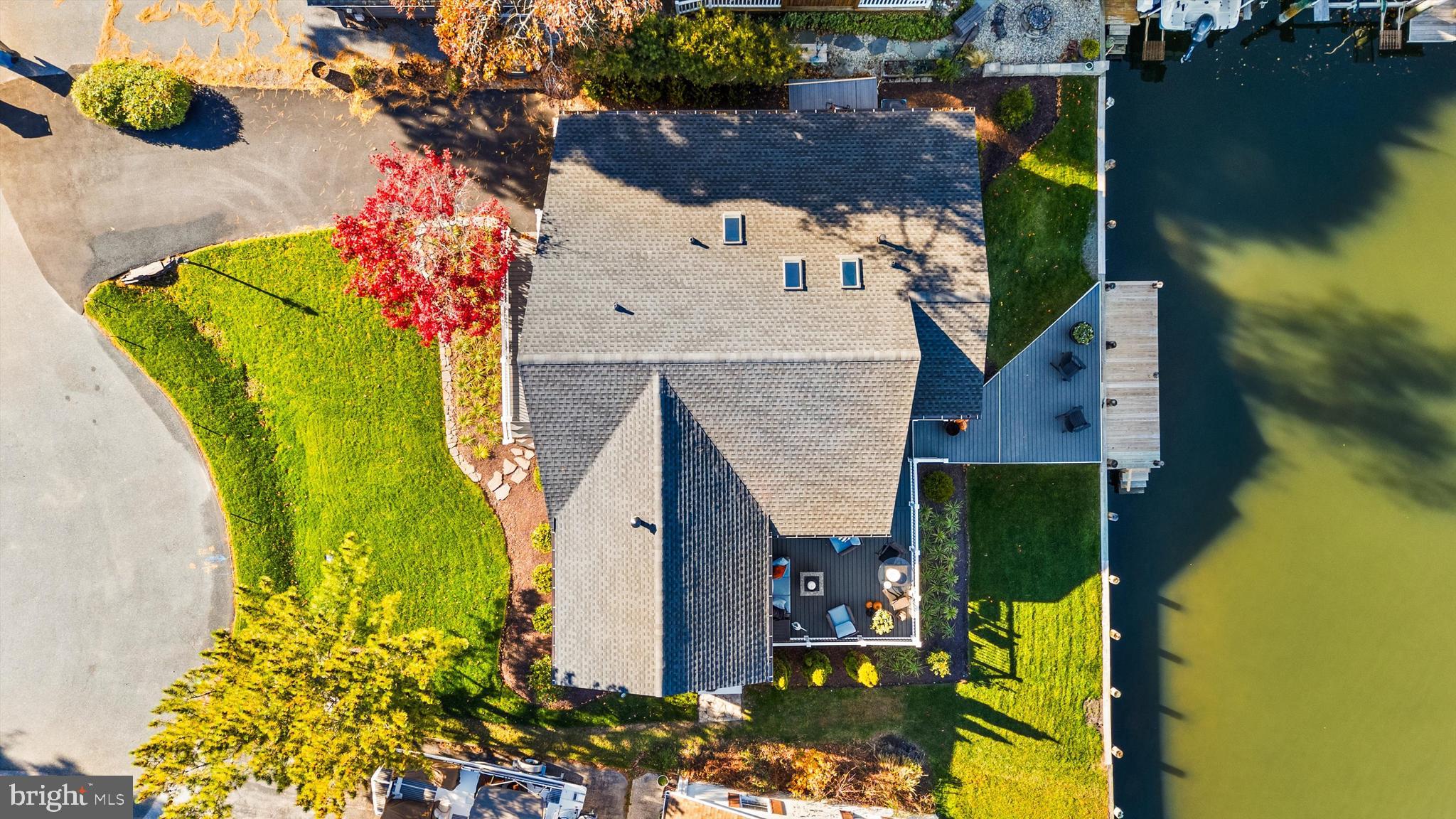 61 Grand Port Road Ocean Pines, MD 21811 - Photo 67 of 68 an aerial view of a house with a garden and swimming pool
