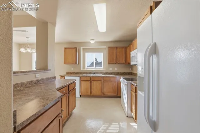 $290,000 | 7084 Ash Creek Heights, Unit 201, Colorado Springs, CO 80922