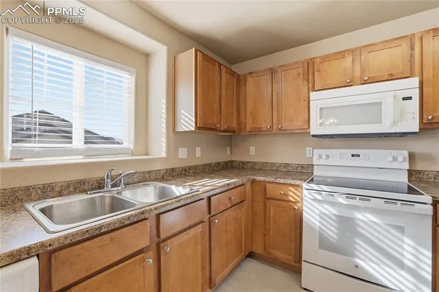 $290,000 | 7084 Ash Creek Heights, Unit 201, Colorado Springs, CO 80922