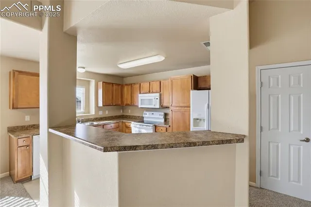 $290,000 | 7084 Ash Creek Heights, Unit 201, Colorado Springs, CO 80922