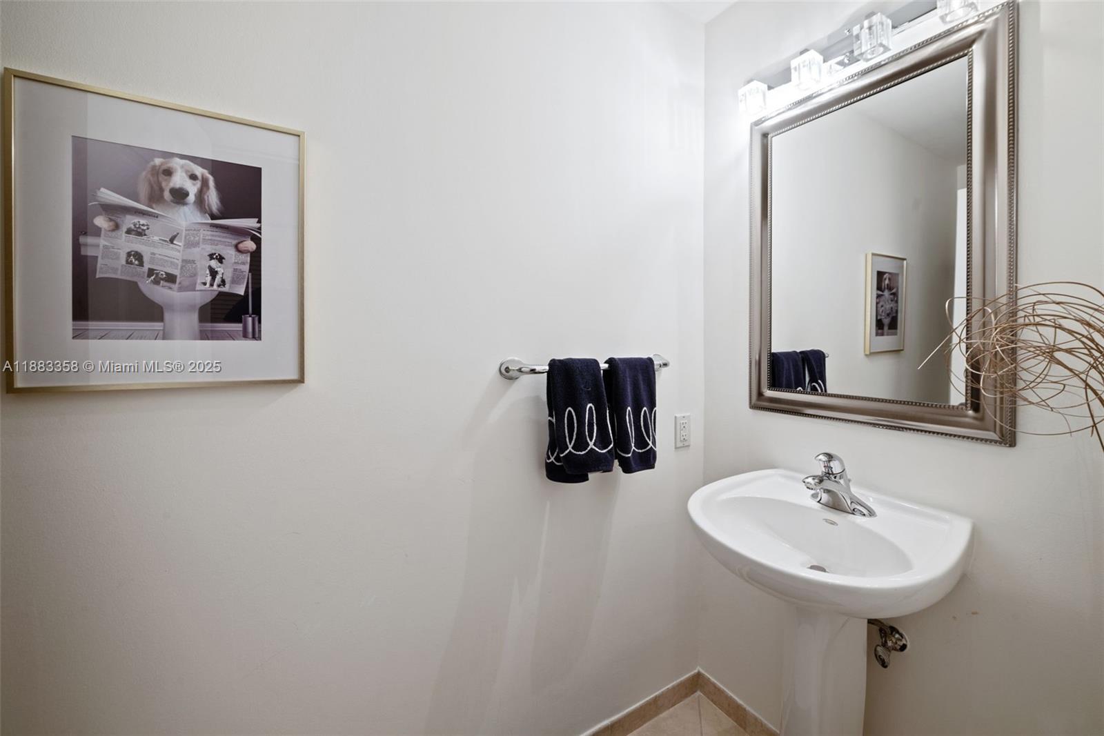 8390 Southwest 72nd Avenue, Unit 314 Miami, FL 33143 - Photo 19 of 35 a bathroom with a sink and a mirror