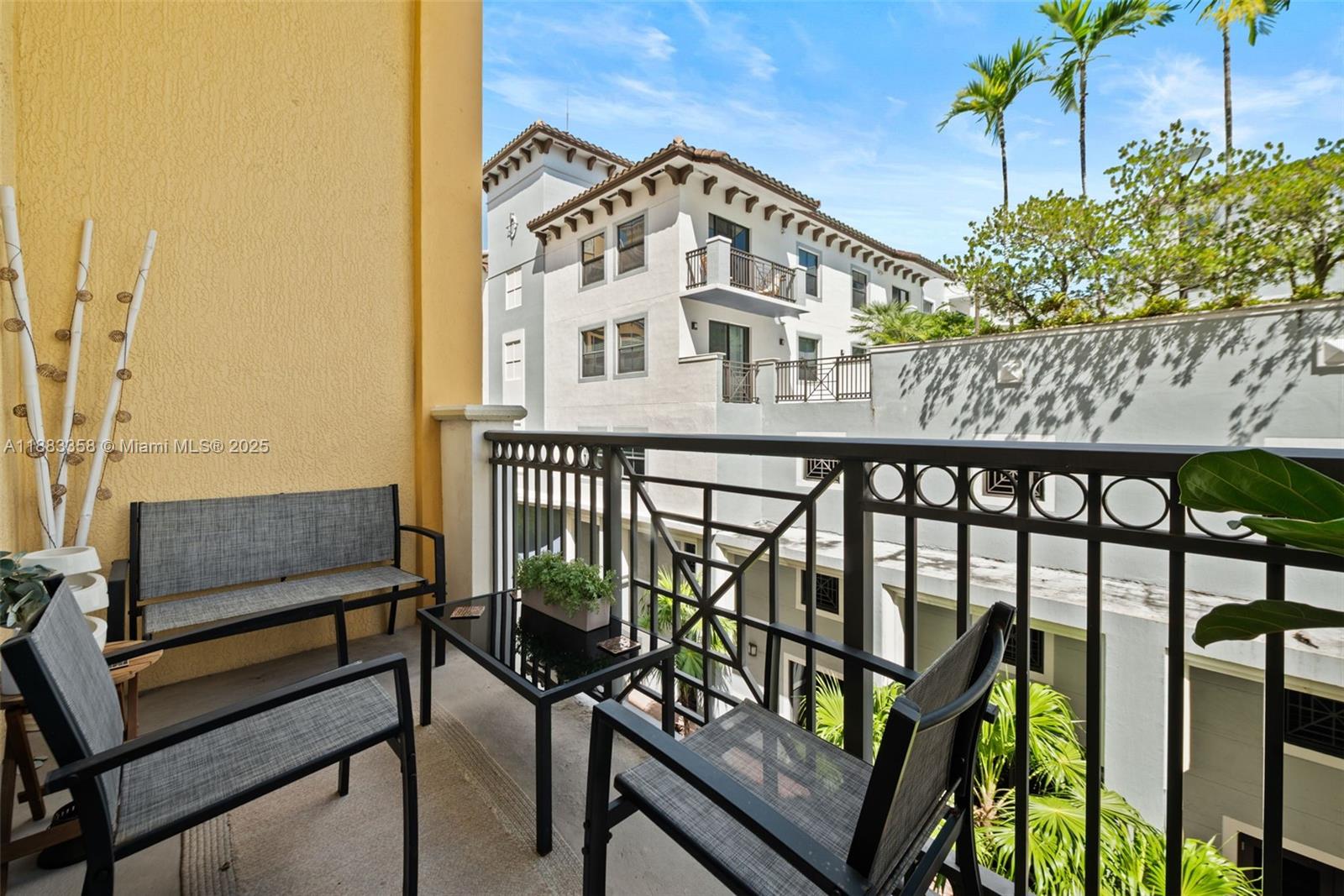 8390 Southwest 72nd Avenue, Unit 314 Miami, FL 33143 - Photo 21 of 35 a view of a balcony with chairs
