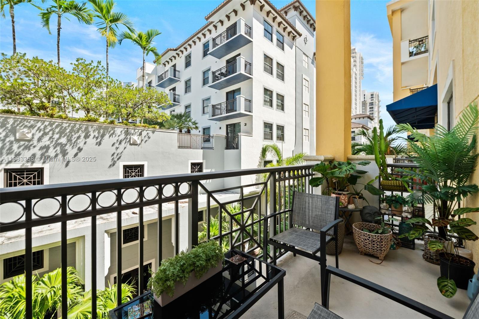8390 Southwest 72nd Avenue, Unit 314 Miami, FL 33143 - Photo 22 of 35 a view of balcony with a potted plant