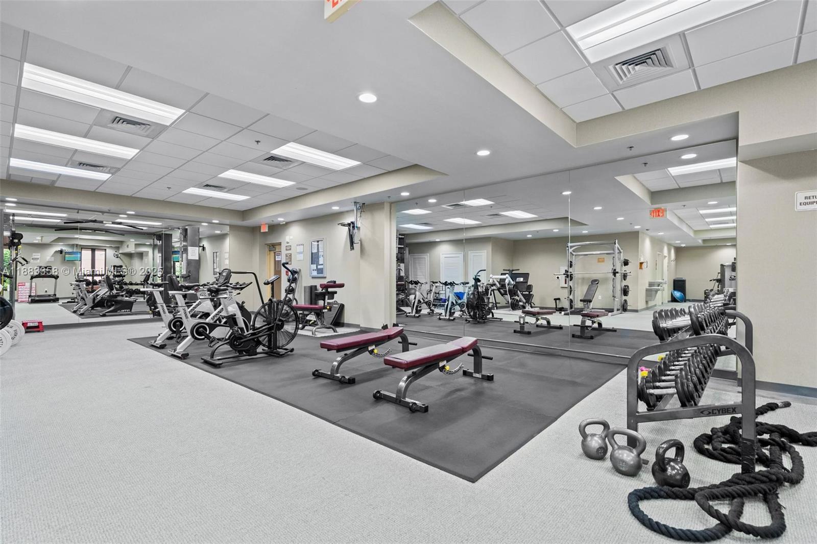 8390 Southwest 72nd Avenue, Unit 314 Miami, FL 33143 - Photo 33 of 35 a view of a room with gym equipment