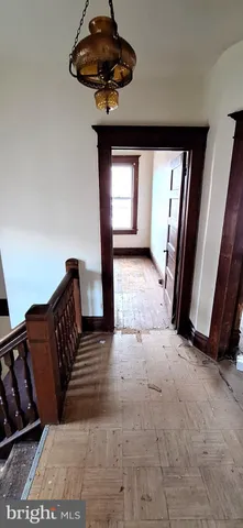 a view of entryway with a front door