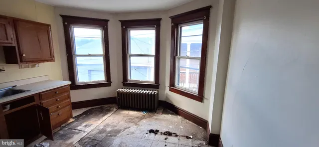 a room with furniture and a window