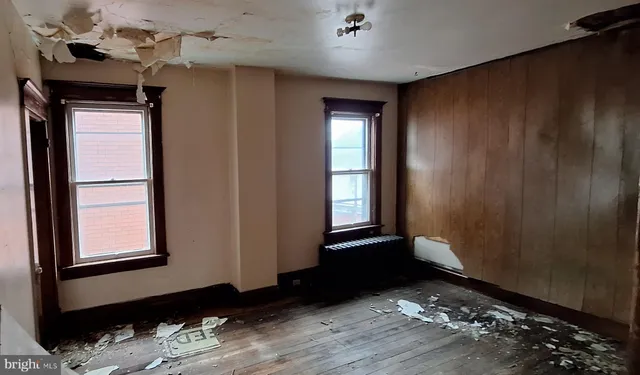 an empty room with windows