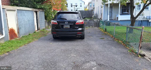 a view of a house with a back yard