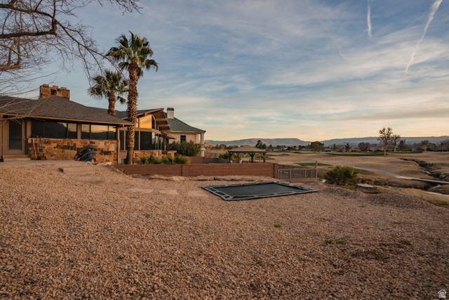 980 Cactus Circle St. George, UT 84790 - Photo 57 of 77 View of yard featuring a mountain view and a patio