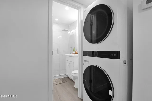 a utility room with dryer and washer