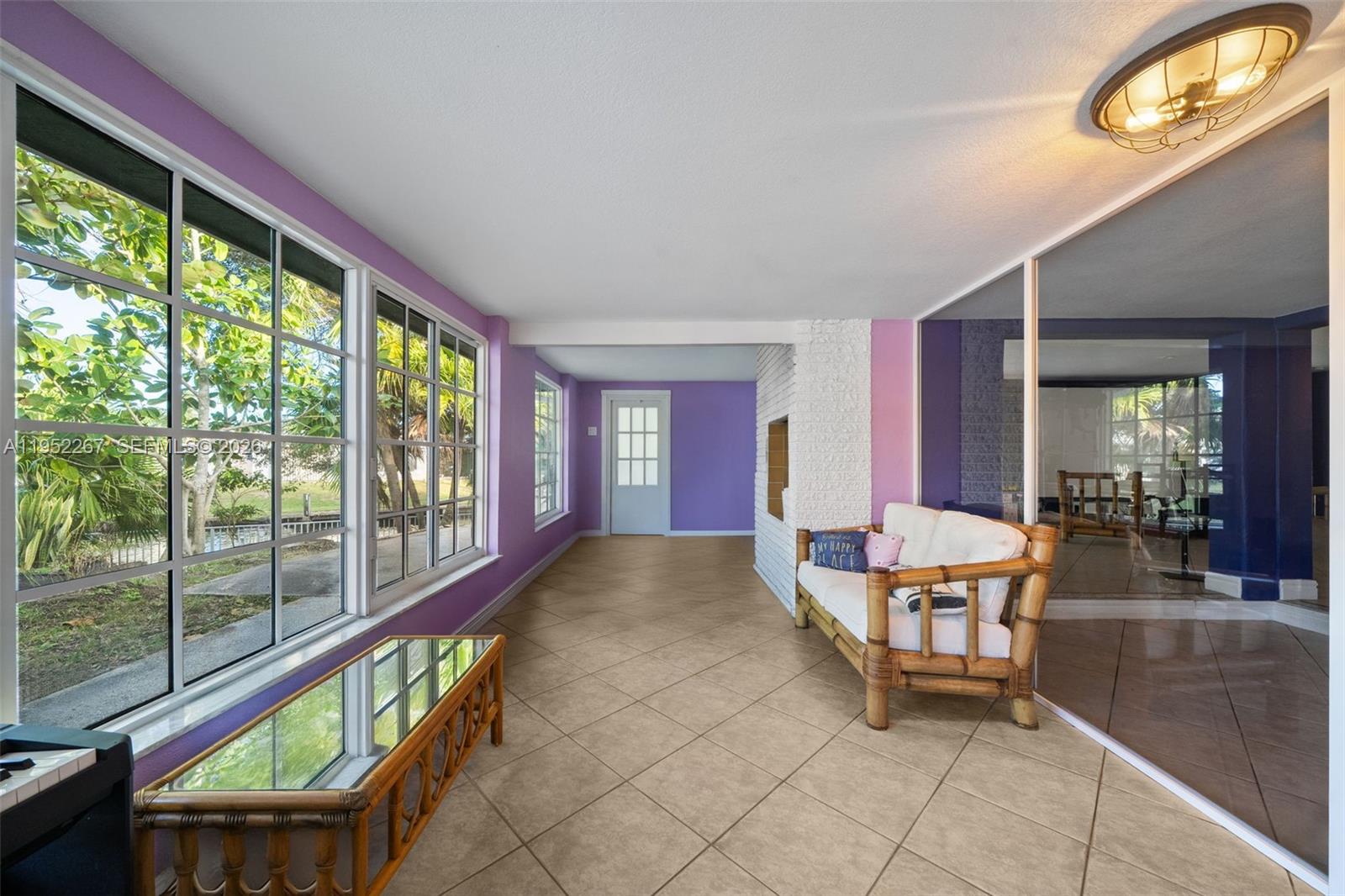 5741 Southwest 14th Street Plantation, FL 33317 - Photo 15 of 29 a view of an chairs and tables in the balcony