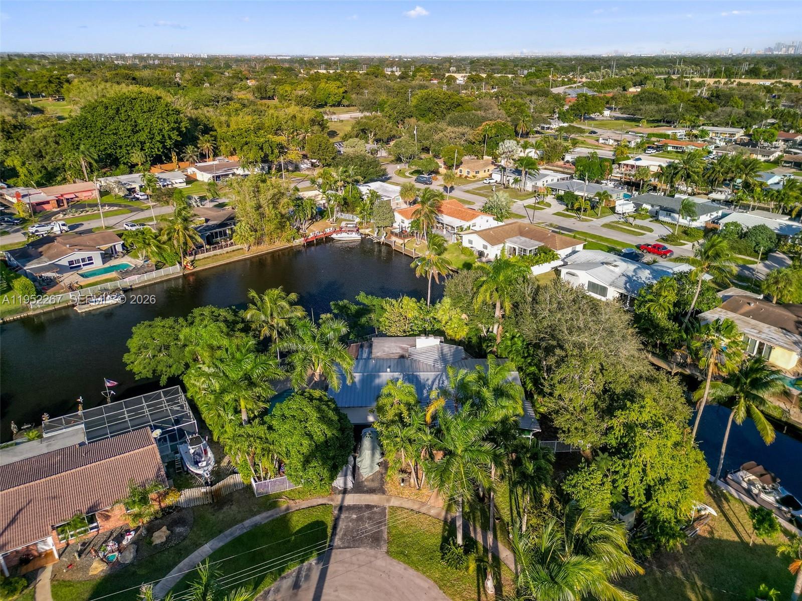 5741 Southwest 14th Street Plantation, FL 33317 - Photo 2 of 29 a view of a city with lush green forest
