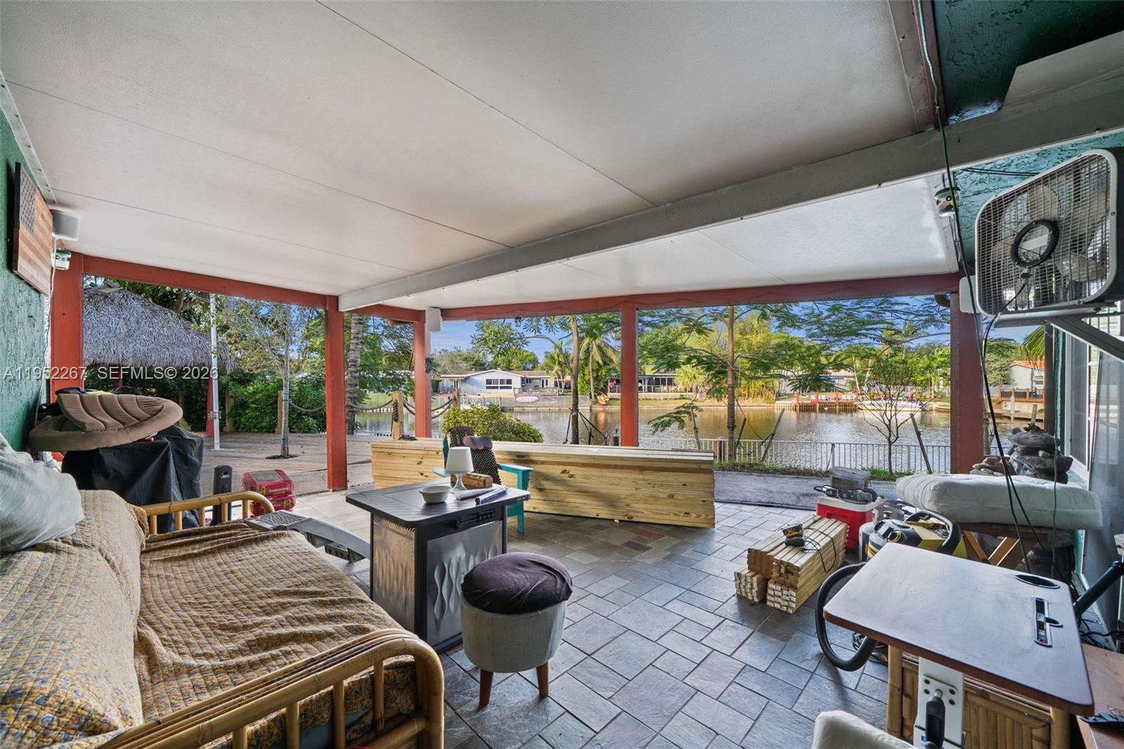 5741 Southwest 14th Street Plantation, FL 33317 - Photo 28 of 29 a bedroom with furniture and a large window