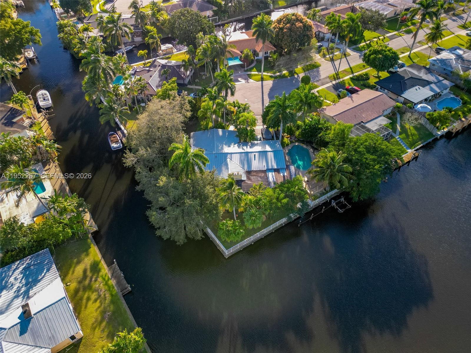 5741 Southwest 14th Street Plantation, FL 33317 - Photo 4 of 29 an aerial view of residential houses with outdoor space and trees