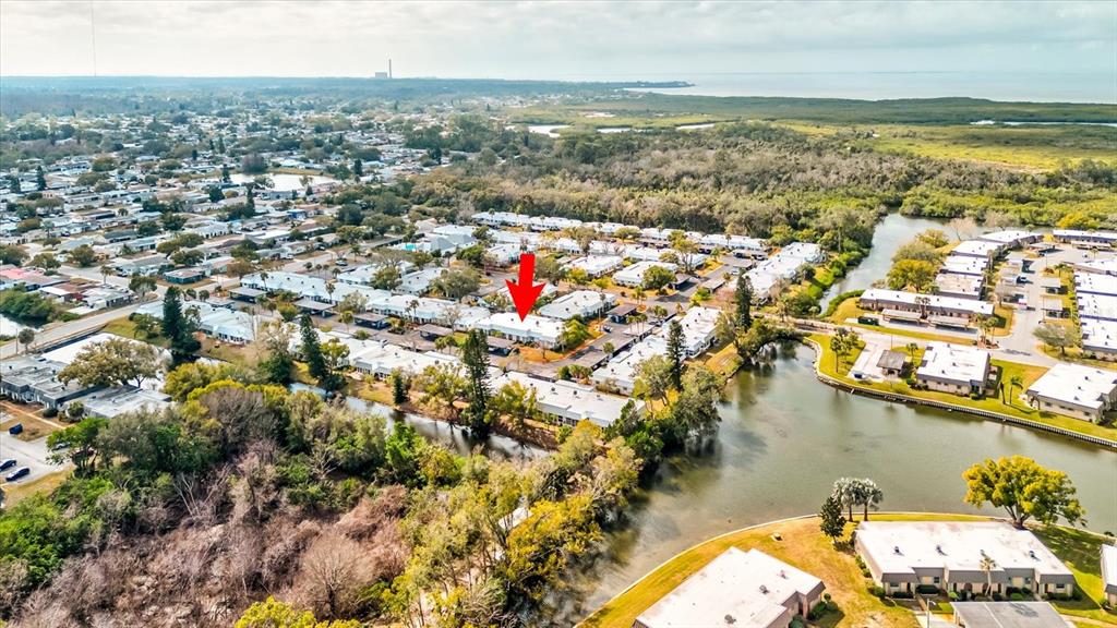 4231 Tamargo Drive, Unit 3 New Port Richey, FL 34652 - Photo 2 of 47 an aerial view of residential houses with outdoor space