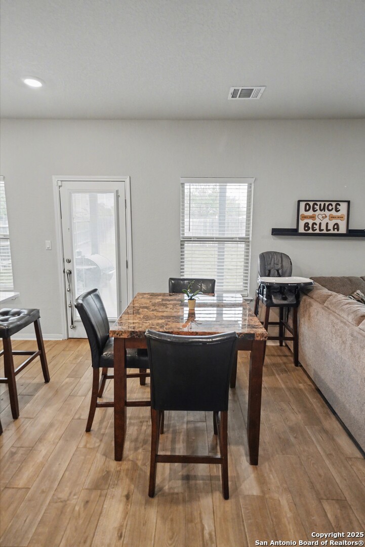 3083 Mondavi Crest Schertz, TX 78154 - Photo 13 of 47 a view of a dining room with furniture and window