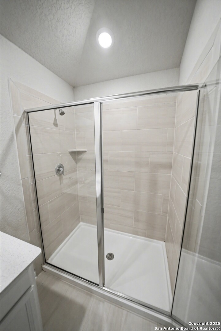 3083 Mondavi Crest Schertz, TX 78154 - Photo 28 of 47 a bathroom with a shower
