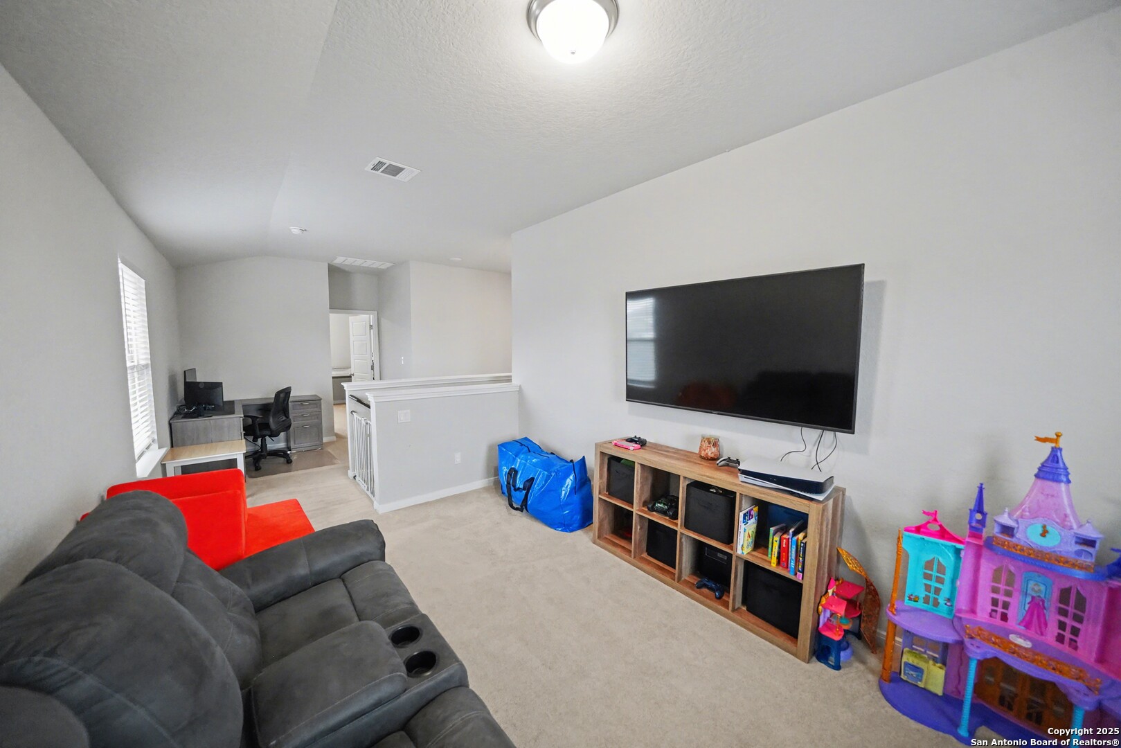 3083 Mondavi Crest Schertz, TX 78154 - Photo 32 of 47 a living room with furniture and a flat screen tv