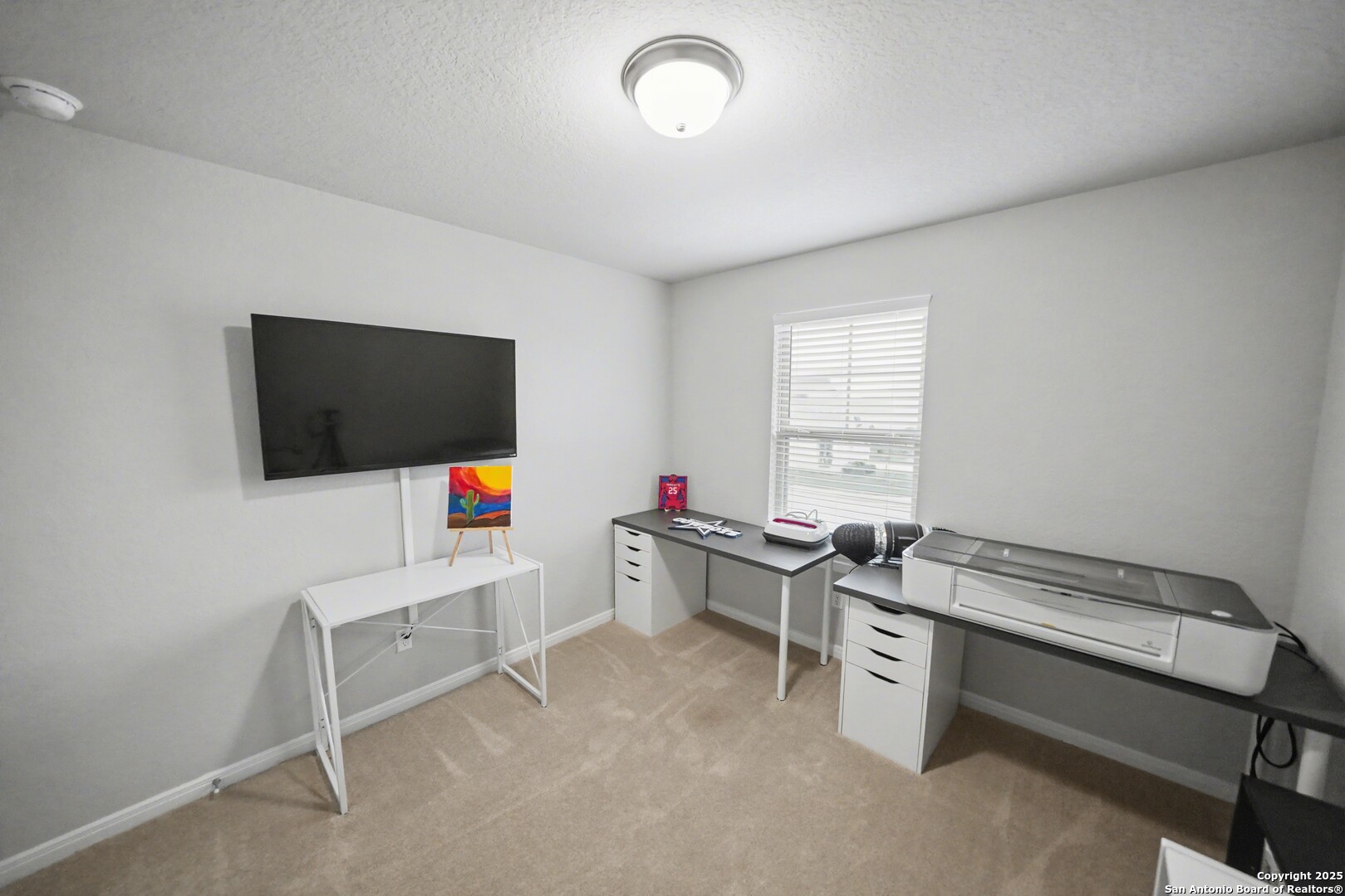 3083 Mondavi Crest Schertz, TX 78154 - Photo 33 of 47 a room with furniture and a flat screen tv