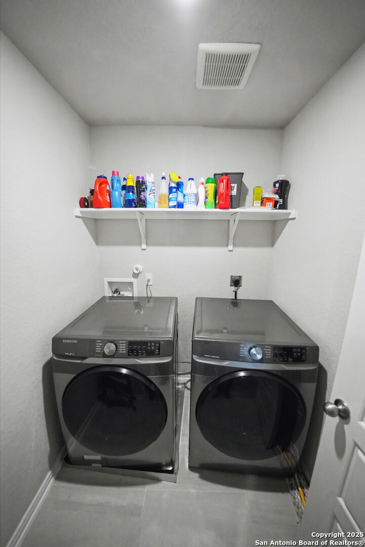 3083 Mondavi Crest Schertz, TX 78154 - Photo 41 of 47 a utility room with a sink and wooden floor