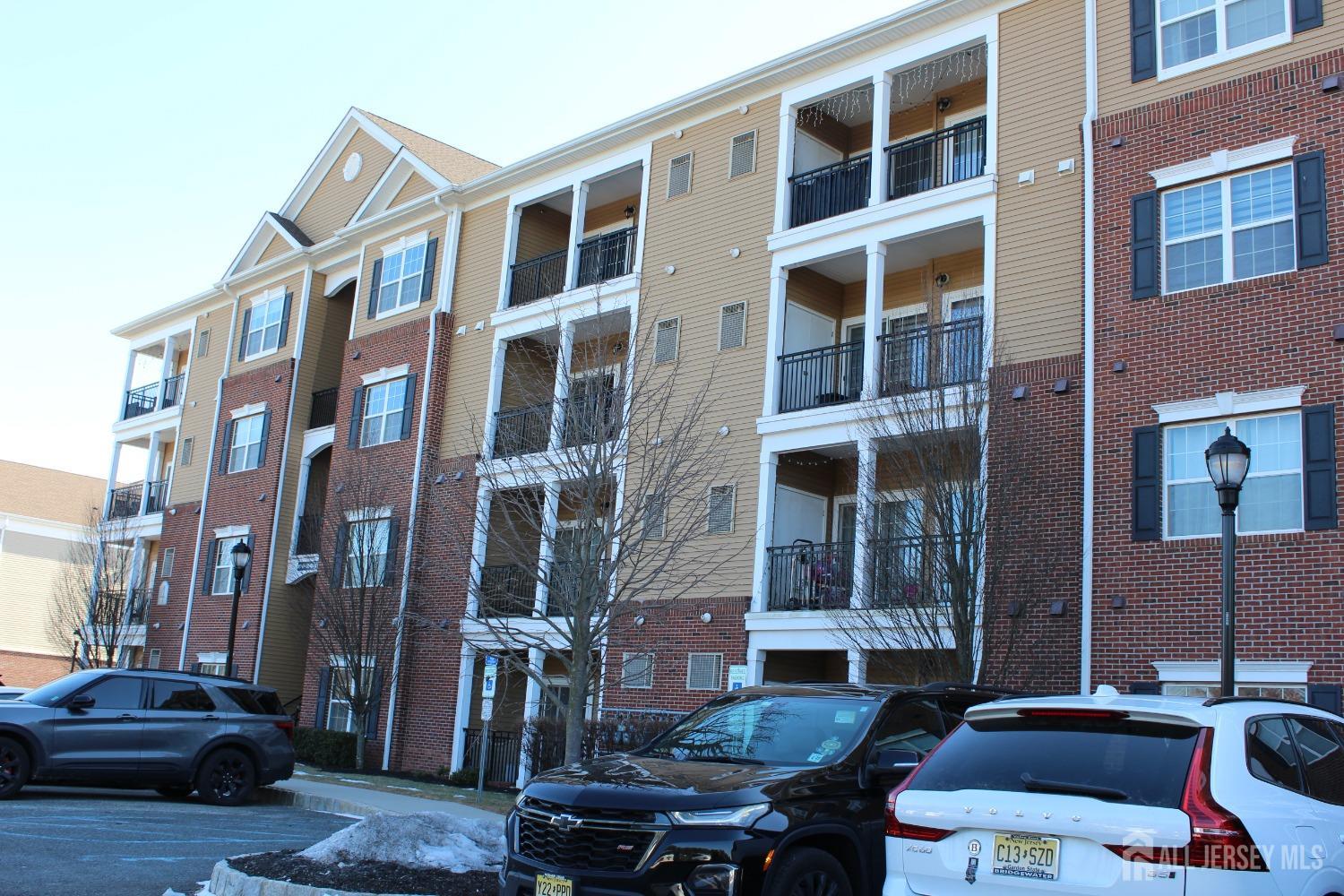 446 Micali Way South Plainfield, NJ 07080 - Photo 26 of 26 a front view of a building with glass windows