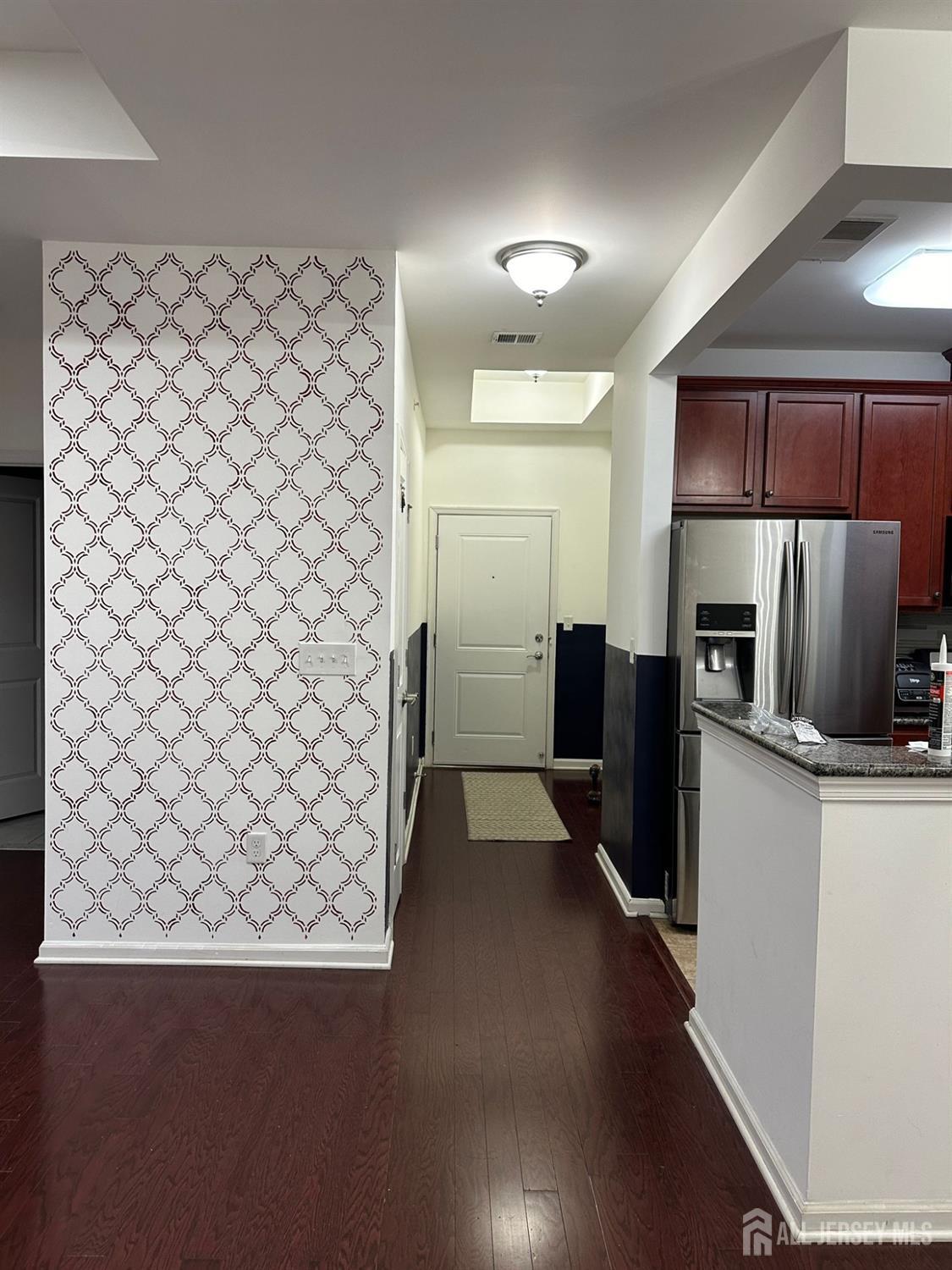 446 Micali Way South Plainfield, NJ 07080 - Photo 9 of 26 a kitchen with a refrigerator and a sink