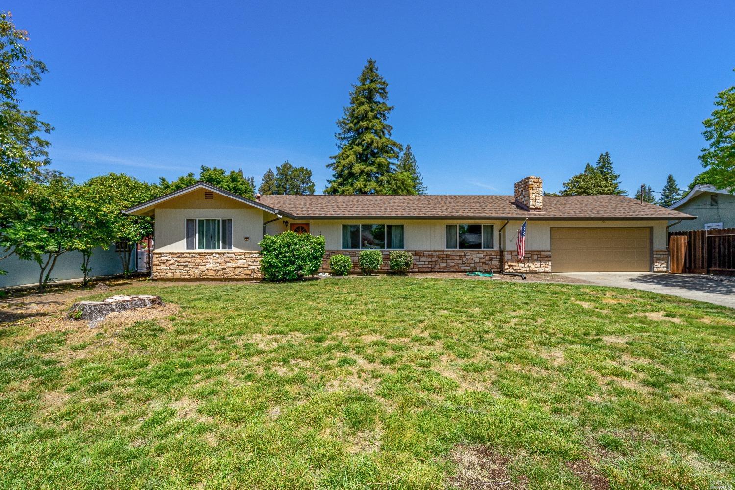 2120 Waverly Street Napa, CA 94558 - Photo 1 of 1 a front view of a house with a garden