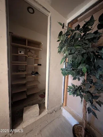 a room with furniture and air hockey table