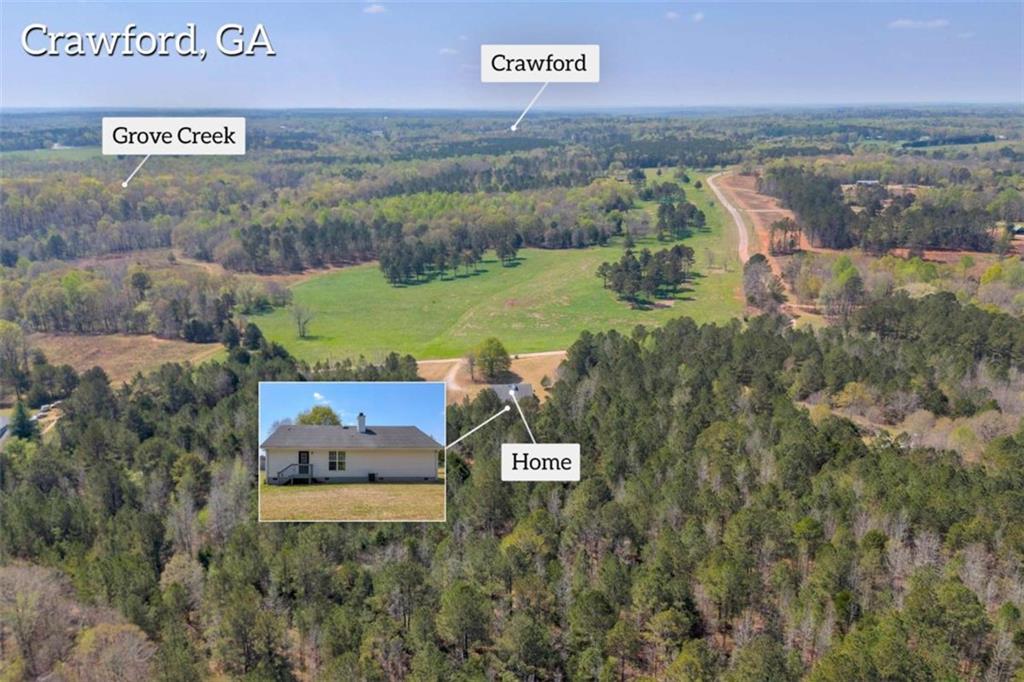 253 Sanders Old Farm Road Crawford, GA 30630 - Photo 3 of 34 a view of a city with an ocean view