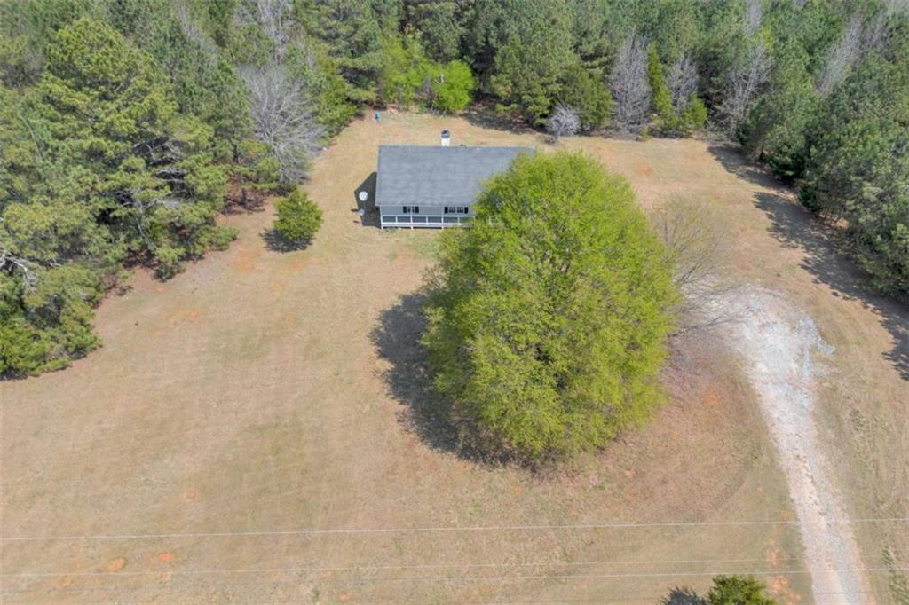 253 Sanders Old Farm Road Crawford, GA 30630 - Photo 8 of 34 an aerial view of a house with a yard