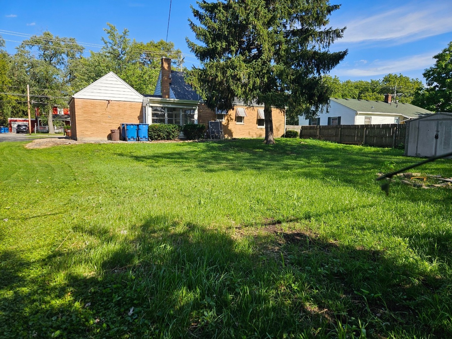 1506 Main Street Crete, IL 60417 - Photo 12 of 17 a front view of house with yard and green space