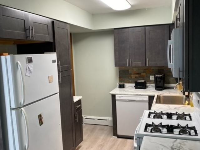 1506 Main Street Crete, IL 60417 - Photo 3 of 17 a kitchen with a refrigerator and a stove