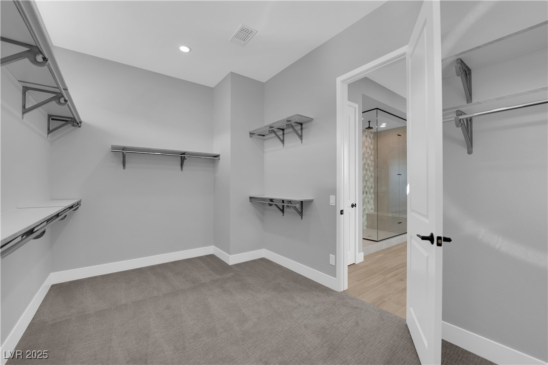 10648 Stone Ledge Avenue Las Vegas, NV 89135 - Photo 56 of 65 Primary bedroom Closet