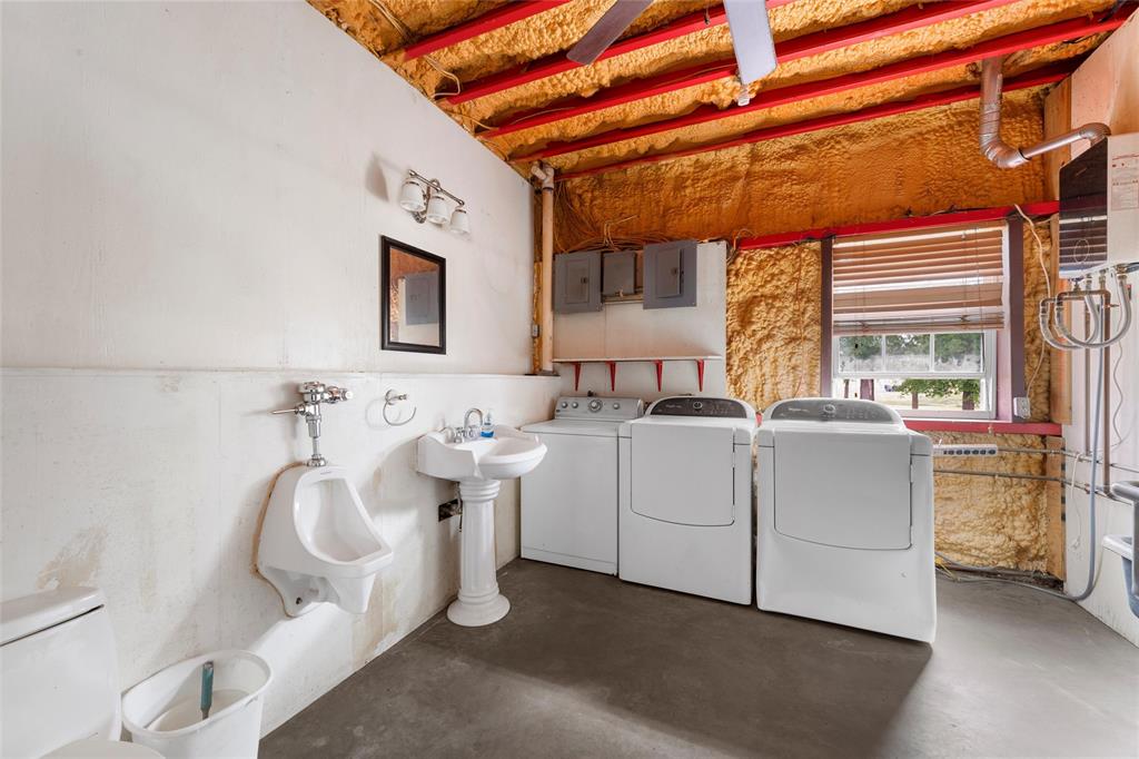 237 Lcr 711 Kosse, TX 76653 - Photo 12 of 40 Clothes washing area with laundry area and washer and clothes dryer
