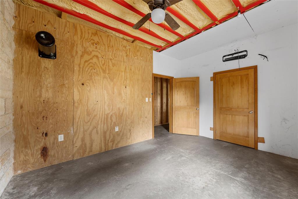 237 Lcr 711 Kosse, TX 76653 - Photo 15 of 40 Empty room featuring concrete floors and ceiling fan