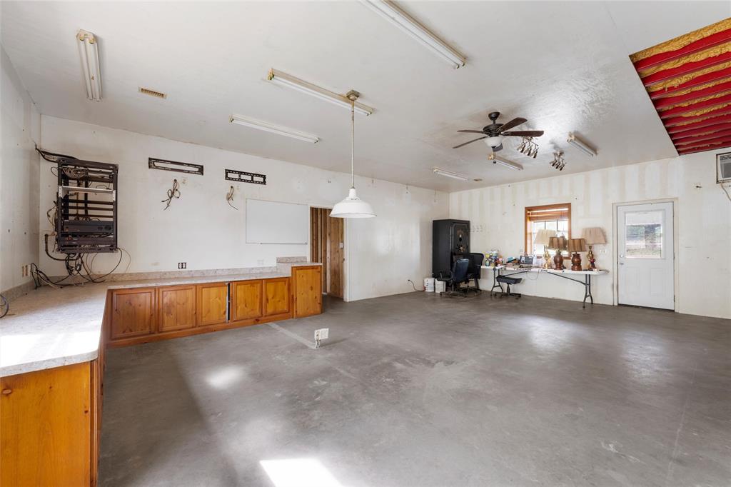 237 Lcr 711 Kosse, TX 76653 - Photo 10 of 40 Garage featuring ceiling fan