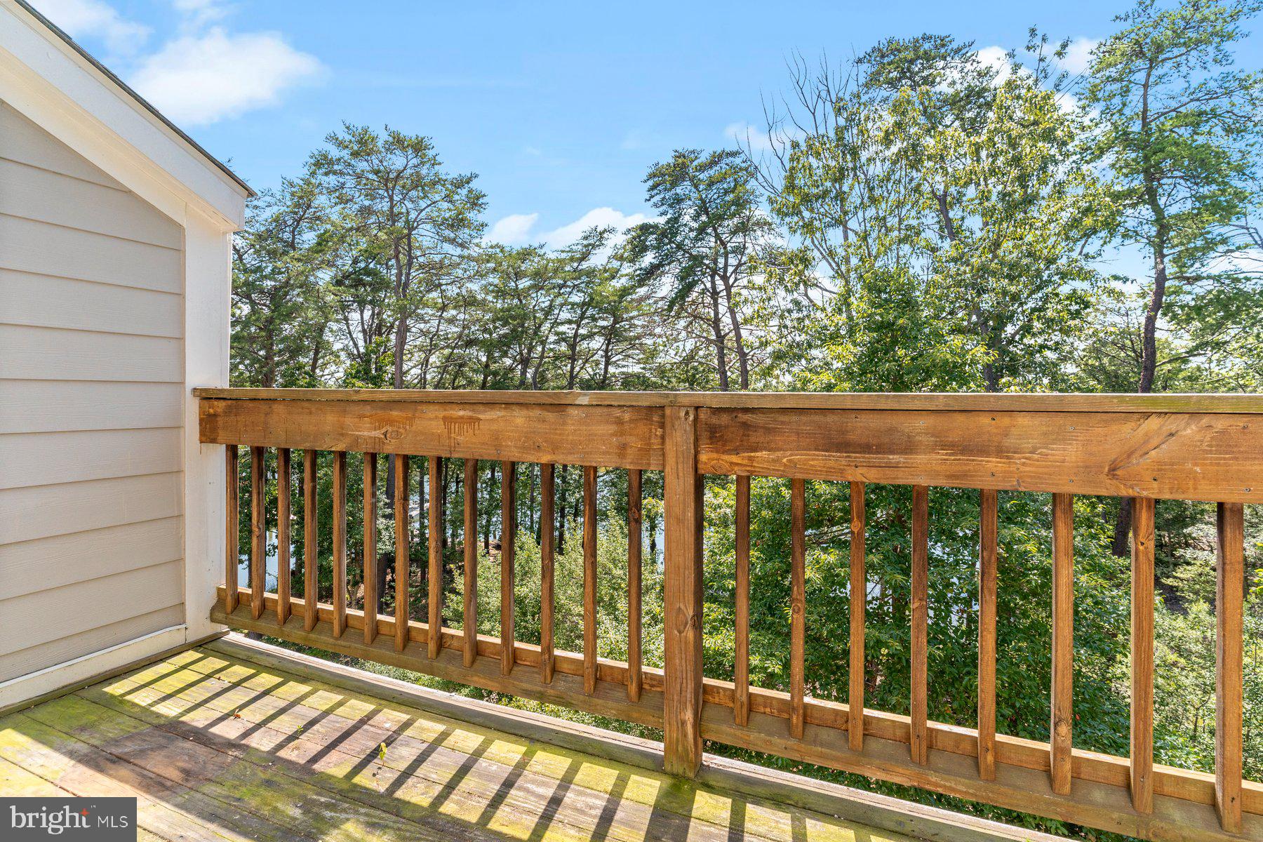 533 Runabout Loop, Unit 533 Solomons, MD 20688 - Photo 20 of 29 a view of a wooden balcony
