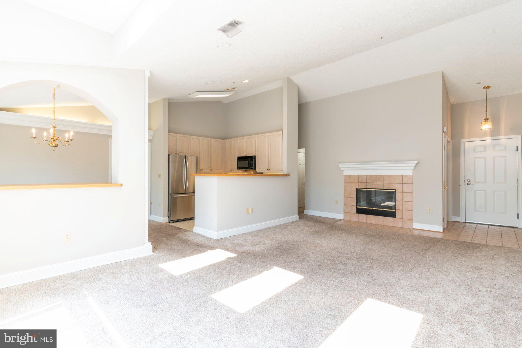 533 Runabout Loop, Unit 533 Solomons, MD 20688 - Photo 2 of 29 a view of a livingroom with a fireplace