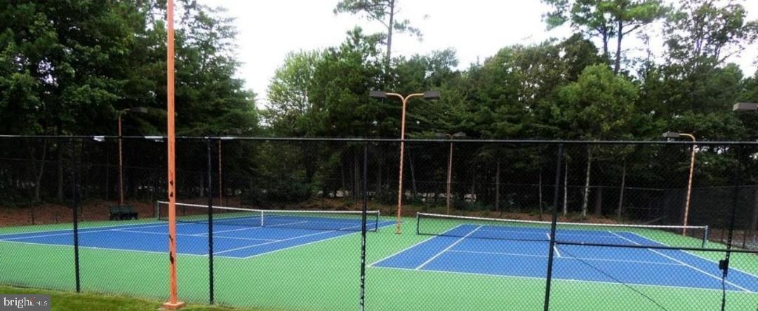 533 Runabout Loop, Unit 533 Solomons, MD 20688 - Photo 26 of 29 a view of a tennis court with fan