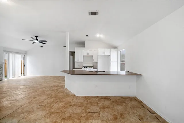 a view interior of the house and kitchen view