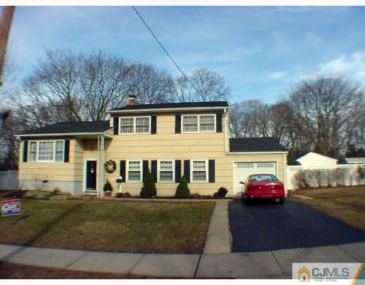 17 Simpson Road Somerset, NJ 08873 - Photo 1 of 8 a front view of a house with a yard