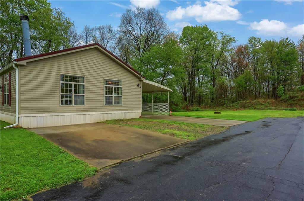 123 Merle Lane New Castle, PA 16101 - Photo 45 of 47 a view of a house with backyard and trees